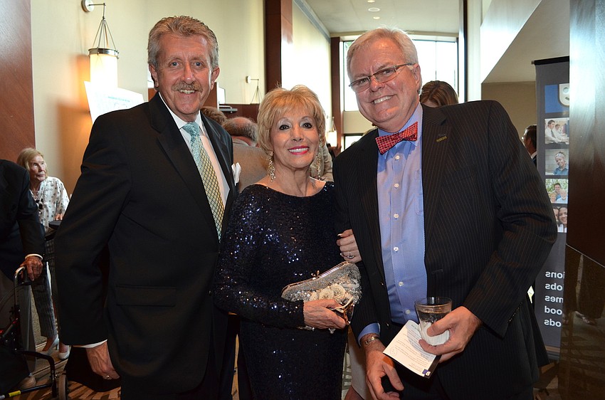 Phil King, honoree Lee Peterson and Dennis Stover