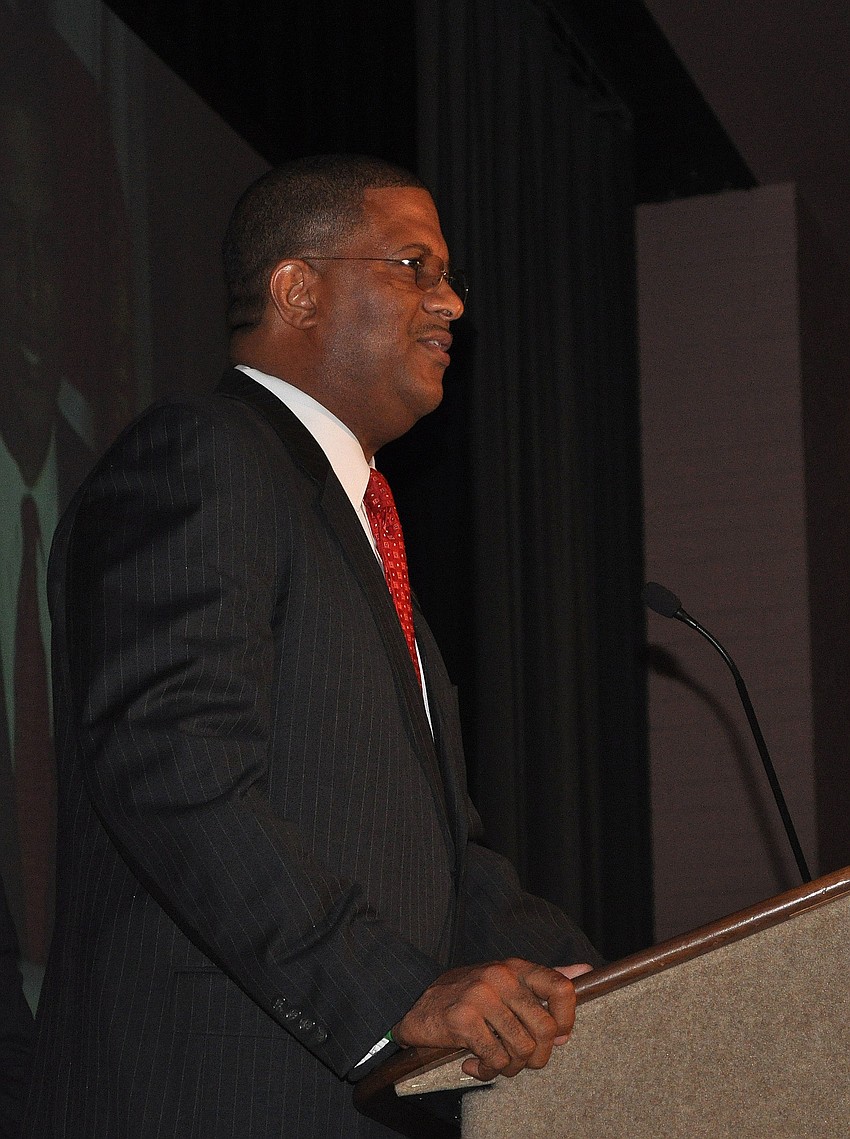 J. Garry Lowe, Chairman, MCRHS Board of Directors, leads the crowd in prayer.