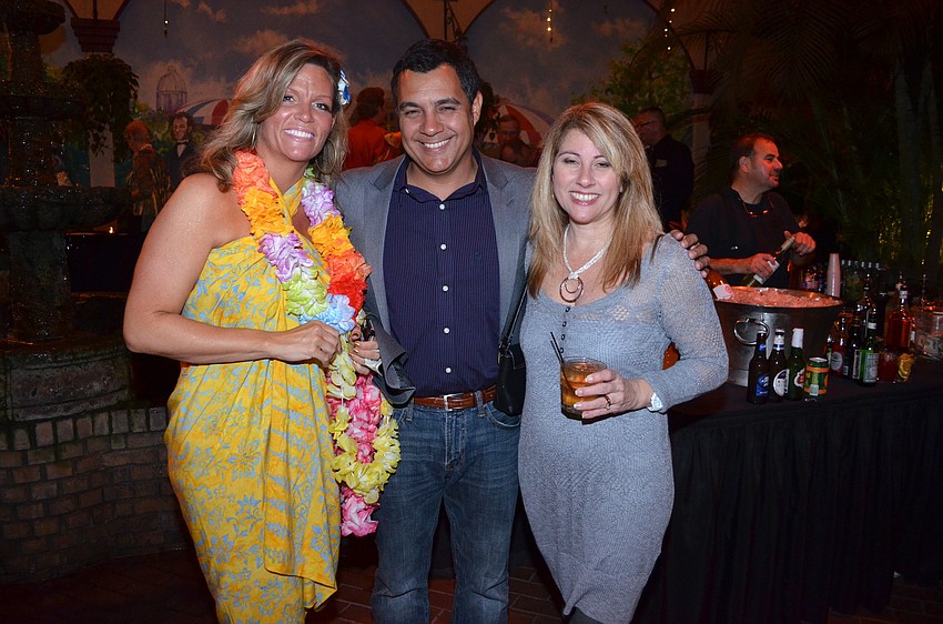 Paula Moore with Carlos and Joan Correa