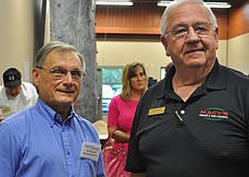 Paul Schmidt and John Macy met up at the networking social.