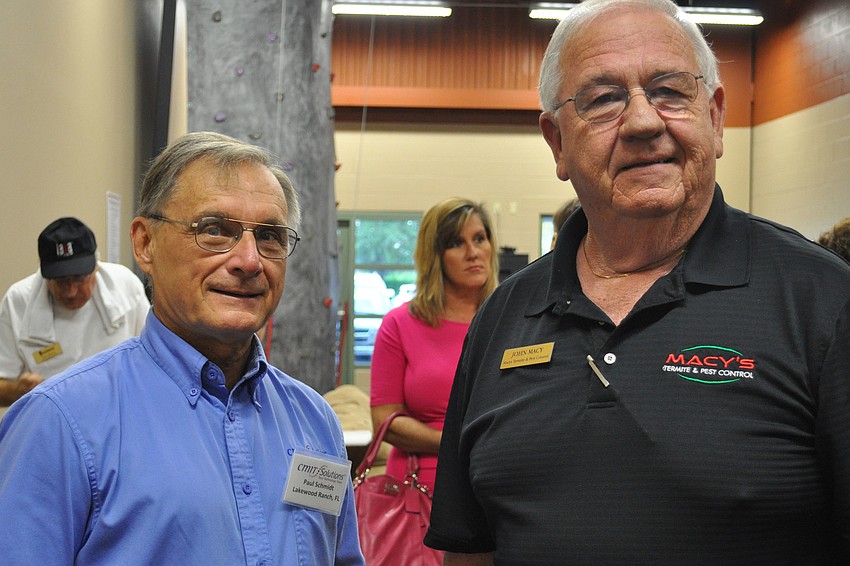 Paul Schmidt and John Macy met up at the networking social.