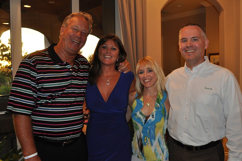 Taylor William Emmons Memorial Foundation founders Mike and Katie Emmons with Payton Wright Foundation founders Holly and Patrick Wright.