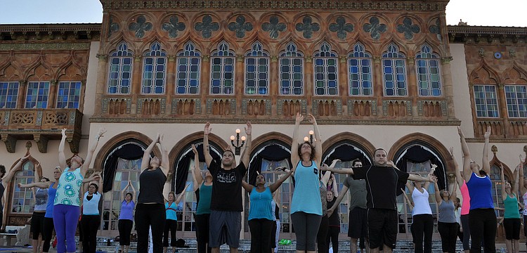 More than 140 people registered to participate in the first monthly Yoga at the Ringling event Saturday, Sept. 15.