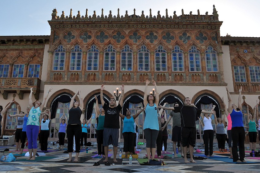 More than 140 people registered to participate in the first monthly Yoga at the Ringling event Saturday, Sept. 15.