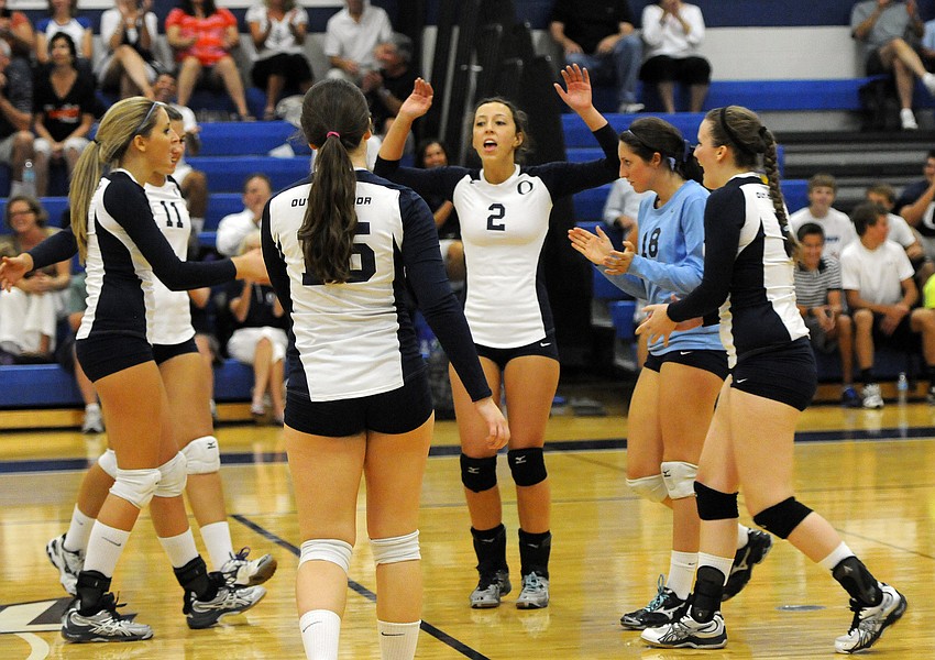 The ODA volleyball team celebrates a point in the first game of its district match versus Bradenton Christian Sept. 13.