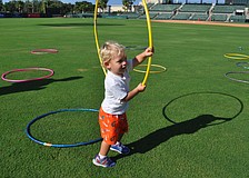 R.J. Lodge plays with a hula-hoop.