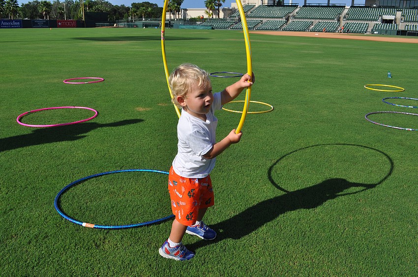 R.J. Lodge plays with a hula-hoop.