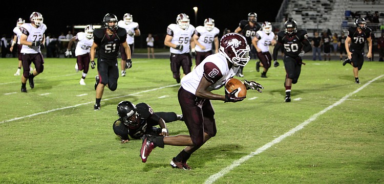 Richie James, No. 2, gets past the Braden River defense during the Braden River versus Riverview game at Braden River.