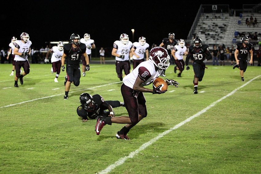 Richie James, No. 2, gets past the Braden River defense during the Braden River versus Riverview game at Braden River.