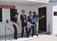 Dolly Jacobs, Sarah Pappas, Pedro Reis and Mitch McKnight cut the ceremonial ribbon.