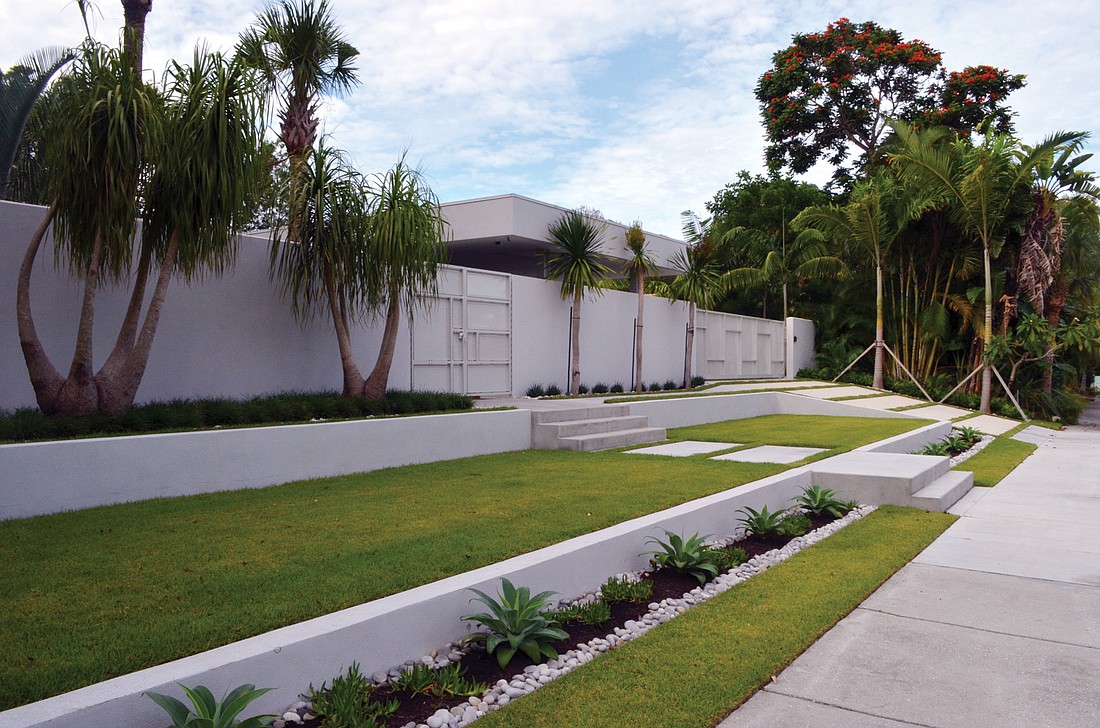 The house was designed on a 5-foot grid, which helps the building and landscape come together. Zoysia grass was used in the front yard because it is more draught tolerant and likes edge conditions.