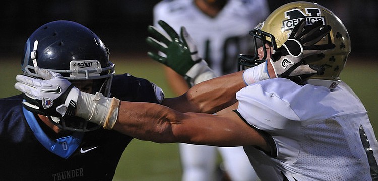 ODAâ€™s Austin Hoppe gets tangled up with a St. John Neumann defender in the first half. Photos courtesy of Tom Hubbard.