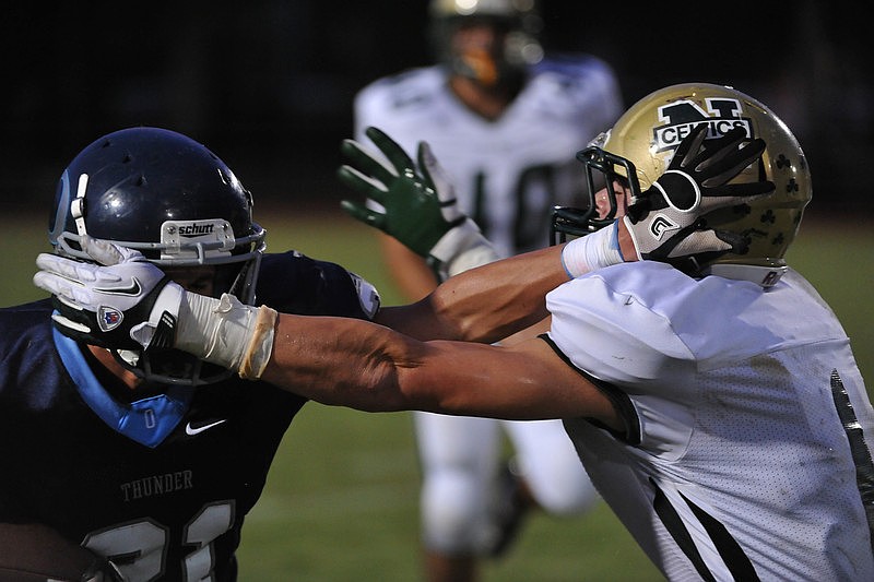 ODAâ€™s Austin Hoppe gets tangled up with a St. John Neumann defender in the first half. Photos courtesy of Tom Hubbard.