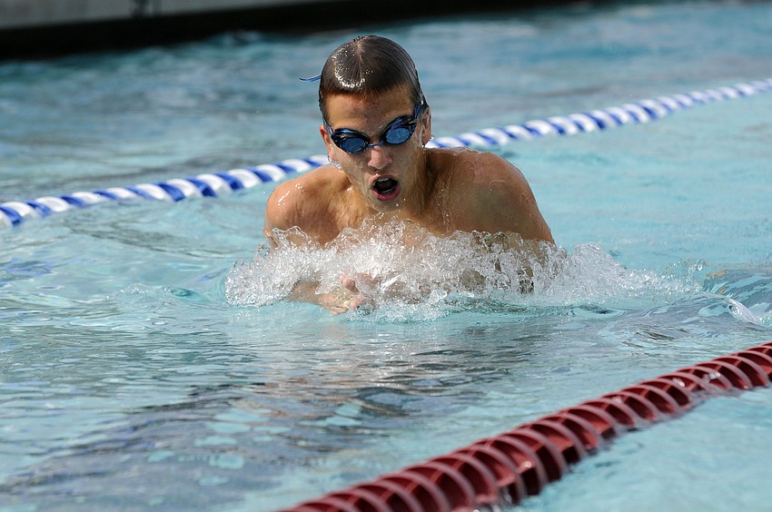 Braden Riverâ€™s Luke Morris keeps an eye on the competition in the 200-yard individual medley where he finished second.