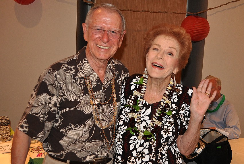 Vincent and Anne Stenger wore outfits they bought in Hawaii to the Knights of Columbus Annual Luau at St. Michael the Archangel.