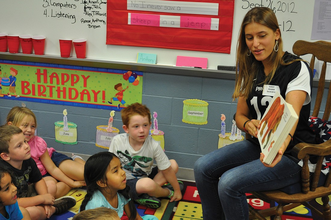 Team Co-Capt. Jenny Linde read "Brown Bear, Brown Bear" to children in Kristie Engelberger's class. Courtesy photo.