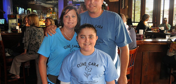 Krissy and Chuck Castellana with Krissyâ€™s daughter, Cara Bodziak, 13