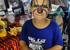 Garrett Sennott shows off his face paint.
