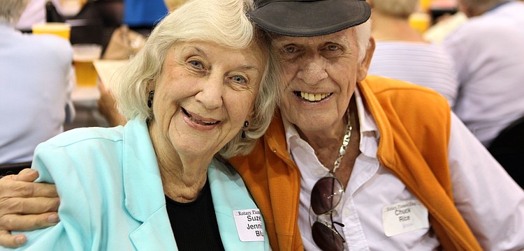 Suzette Jennings Blue and Chuck Rice pose together Sunday, Oct. 7, at the 38th annual â€œPioneer Dayâ€ Picnic. Rice wore his old Sarasota High School ball cap to the event.