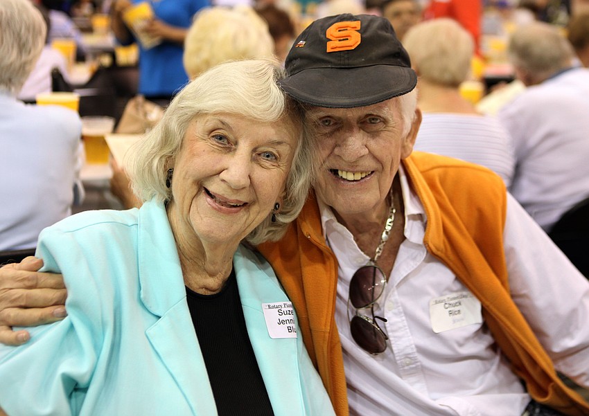 Suzette Jennings Blue and Chuck Rice pose together Sunday, Oct. 7, at the 38th annual â€œPioneer Dayâ€ Picnic. Rice wore his old Sarasota High School ball cap to the event.