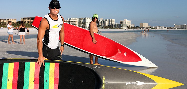 Brad Ward and Robert Martini with their paddleboards.