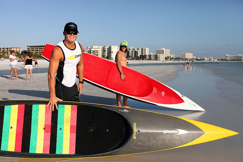 Brad Ward and Robert Martini with their paddleboards.