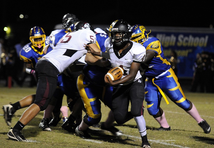Braden River freshman Breyon Pittman attempts to break for the outside during the Pirates non-district game at Bayshore Oct. 11.