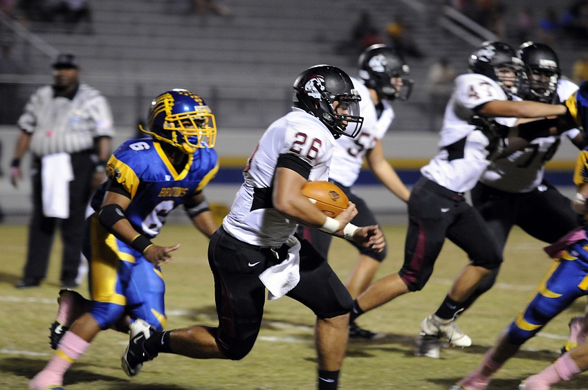 Braden River senior running back Austin Rain looks for an open running lane.