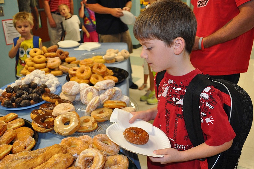 Ethan Holley, 7, loaded up on breakfast with his dad, Andrew , and brother, Hudson, both not pictured.