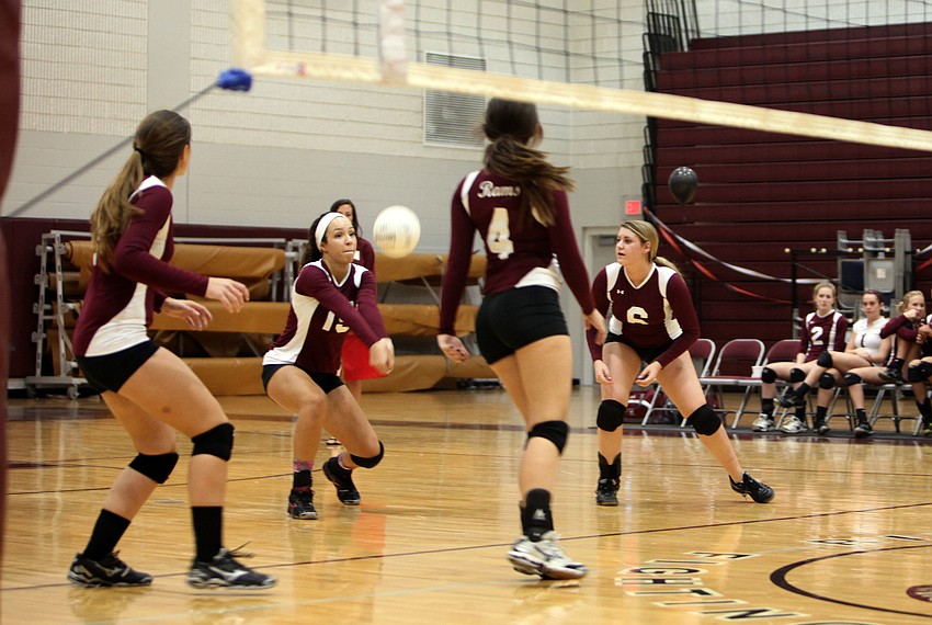 Natasha Samuel, No. 15, bends down to bump the ball sent over the net by the Booker Tornadoes Tuesday, Oct. 16, at Riverview High School.