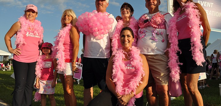 Marta and Mia Windsor got a picture with fellow walkers Ginny Calcutti, Ken Nelson, Diane and Bob Bourlier, Sue Tankersley and Denise Nitty, front.