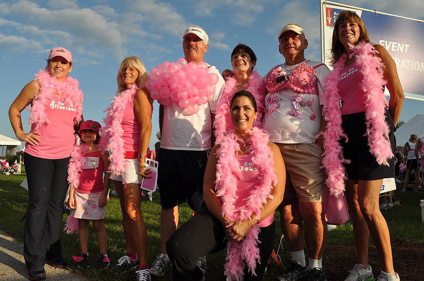Marta and Mia Windsor got a picture with fellow walkers Ginny Calcutti, Ken Nelson, Diane and Bob Bourlier, Sue Tankersley and Denise Nitty, front.