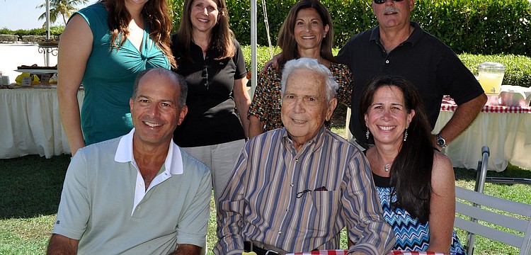 Hal Lenobel, seated in center, surrounded by his family, from left to right, Jeff Lenobel, Allison Elder, Judith Elder, Donna Lenobel, Keith Robinson and Sandy Robinson