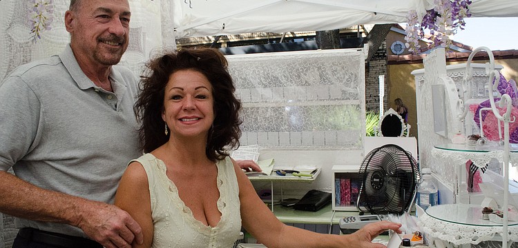 Debra Larson and Jack Fernandez sell Swarowski Crystal Jewelry.