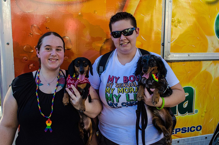 Megan Howard brought her dog Karuso and Rebecca Alles came with her dog Sterling to celebrate Pride Fest 2012.
