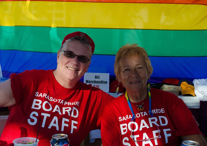 Susan Pringle and Glow Hoeft sell t-shirts to support Sarasota Pride.