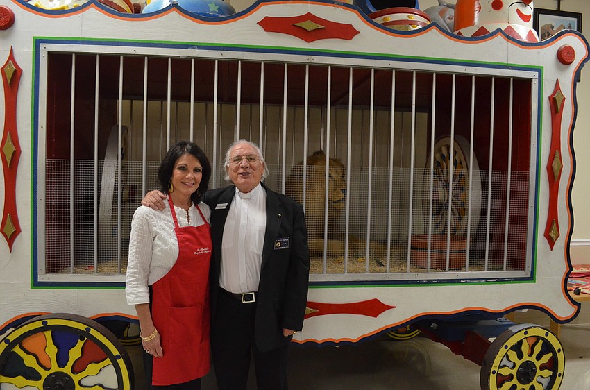Rev. Fausto Stampiglia poses for a photo with Beth Cannata, Chair of the Hospitality Committee.
