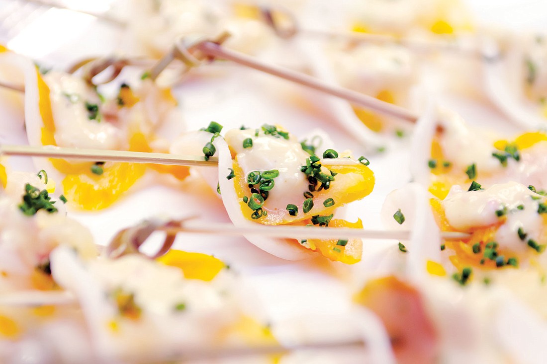An hors d'oeuvre of smoked haddock with daikon radishes and shallot vinaigrette