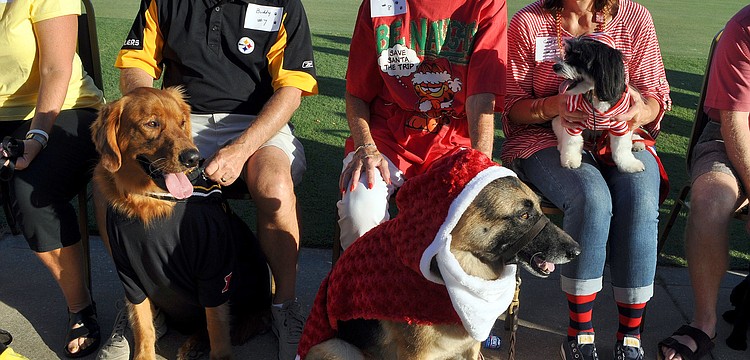 Dick Beitel with Buddy, 3, Babe Hart with Diamond, 8, and Suzie Lee with Cooper, 4