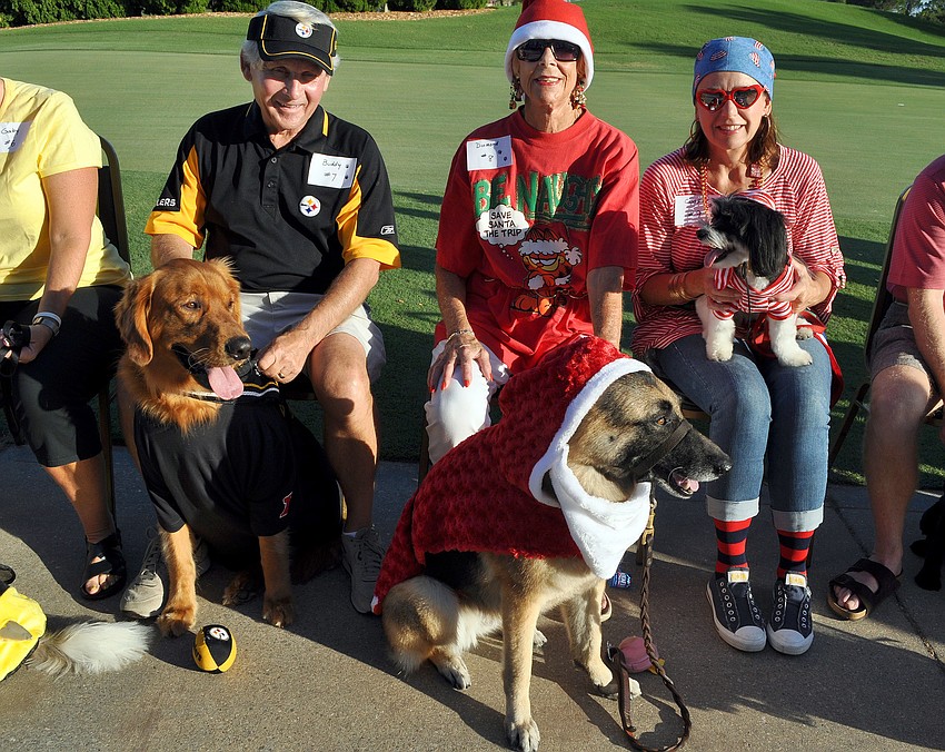 Dick Beitel with Buddy, 3, Babe Hart with Diamond, 8, and Suzie Lee with Cooper, 4