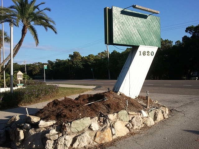 An old, tilted palm tree has been removed from the front of the Colony Beach & Tennis resort property and will be replaced with flowers.