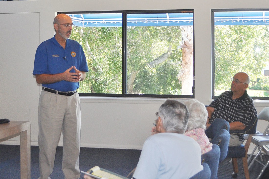 Town Manager David Bullock addresses Condo Fed members Saturday at Bayport Beach & Tennis Club.
