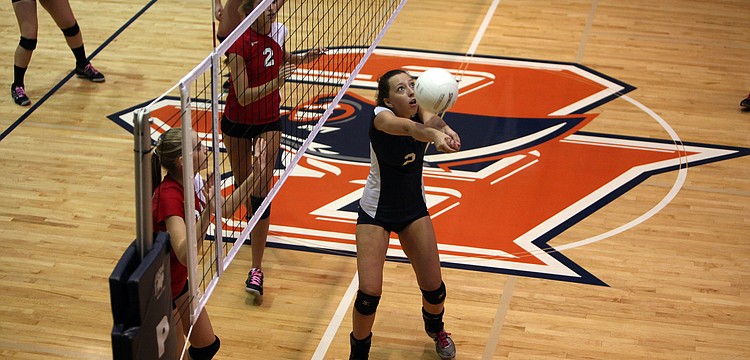Haley Preininger, No. 2, bumps the ball over the net.