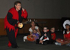 Marilyn Nykiforuk, assistant manager at Selby Public Library, tells a not so scary, scary story Wednesday, Oct. 24, at Selby Public Libraryâ€™s Halloween Party.