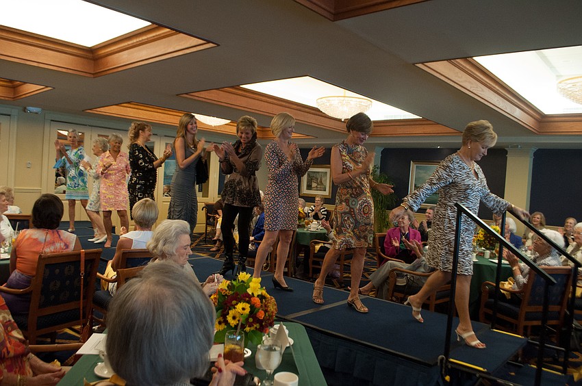 The models exit the catwalk.