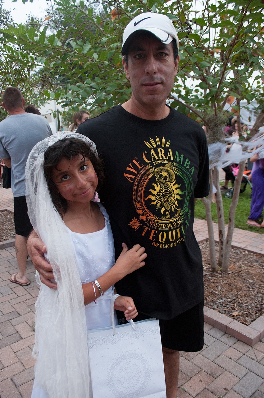 Frida attended pumpkin night with her father Sergio Herrera.