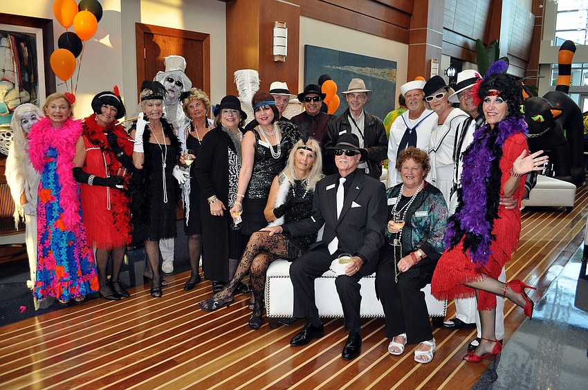 A group of Sarasota Yacht Club members dressed up in 1920s garb to celebrate the decade that the club was founded.
