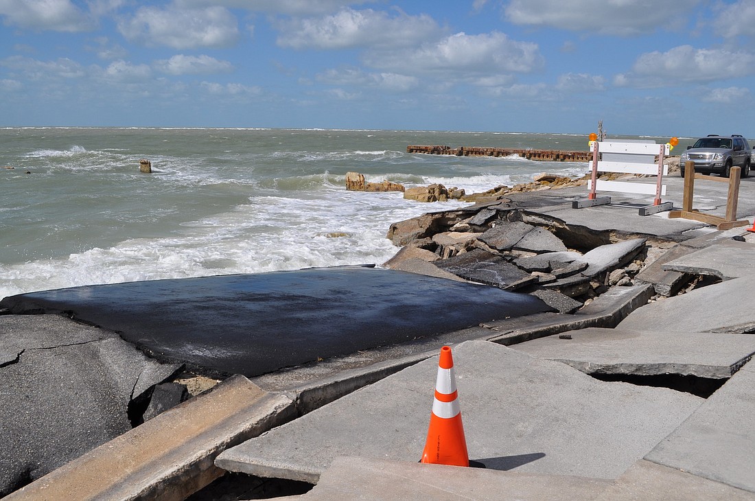Sarasota County blocked access to Beach Road properties after the recently repaired road collapsed from erosion.