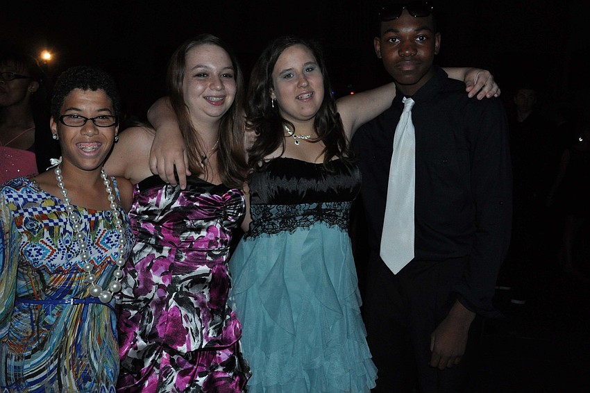 Danielle Wilkins, Amber Aikman, Faith Martel and Jaquez Fisher, at the Homecoming Dance.