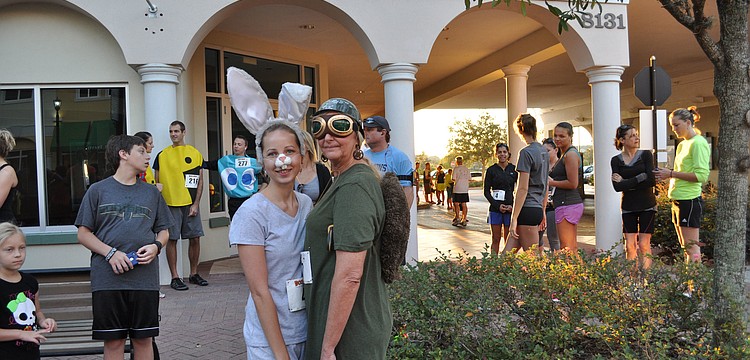 Charity Burke and Cathy Burke posed before the Boo Run.